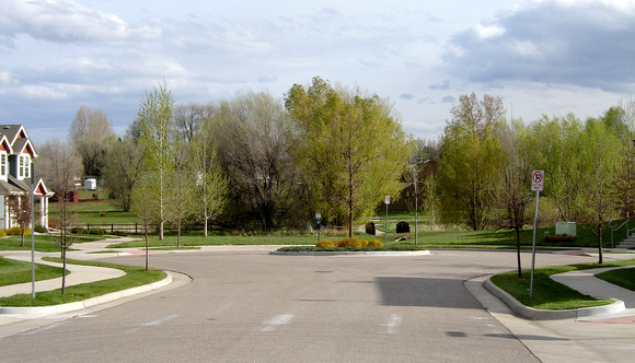 Pinnacle Townhomes with Spring Creek Trail in background